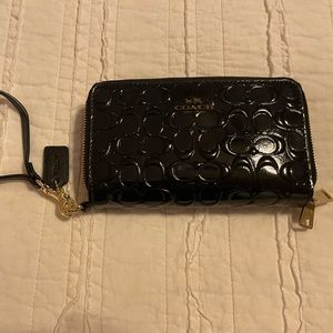 Coach Shiny Black Wristlet/wallet with gold accents